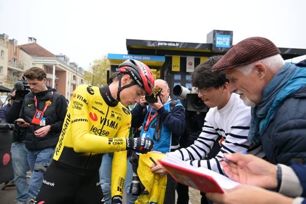 Danish Jonas Vingegaard of Team Visma-Lease a Bike signs autographs at the start of the first stage of 84th edition of the Paris-Nice cycling race, 170,9 km from Archeres to Carrieres-sous-Poissy, Sunday 08 March 2026. DAVIDxPINTENS  x166843001x
