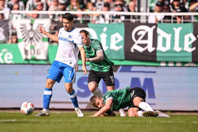08.03.2026, Fussball, 2. Bundesliga, 25. Spieltag Saison 2025 2026, Preußen Münster - Hertha BSC, Josip Brekalo (Hertha BSC), Marvin Schulz (Preußen Münster), Jano ter Horst (Preußen Münster) xRHR-FOTO TKx