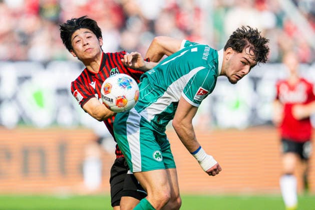 08.03.2026 - Fußball, 2025 2026, 2. Bundesliga, 25. Spieltag, Hannover 96 - SpVgg Greuther Fürth: (L-R) Daisuke Yokota (Hannover), Reno Münz (Fürth) DFL REGULATIONS PROHIBIT ANY USE OF PHOTOGRAPHS AS IMAGE SEQUENCES AND OR QUASI-VIDEO.