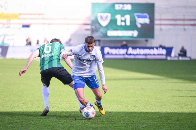 08.03.2026, Fussball, 2. Bundesliga, 25. Spieltag Saison 2025 2026, Preußen Münster - Hertha BSC, Marcel Benger (Preußen Münster), MichaÃ«l Cuisance (Hertha BSC) xRHR-FOTO TKx