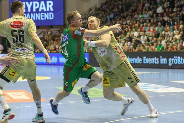 08.03.2026, xgox, Handball - Daikin HBL SC Magdeburg - TSV Hannover-Burgdorf emspor, v.l. Omar Ingi Magnusson (Magdeburg, 14), Justus Fischer (Hannover, 54) Zweikampf, Duell, Kampf, tackle Magdeburg