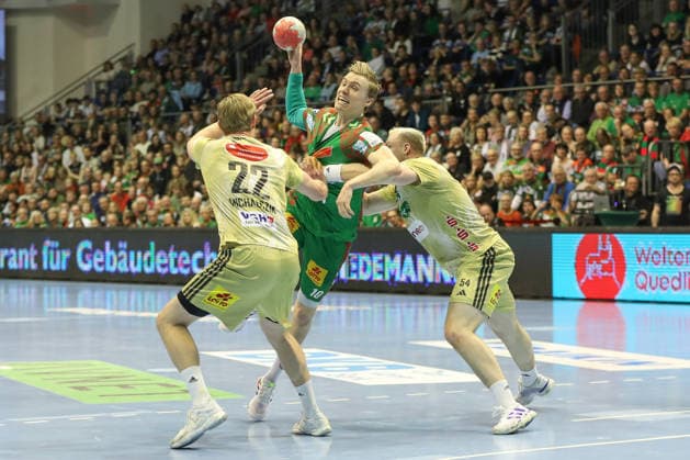 08.03.2026, xgox, Handball - Daikin HBL SC Magdeburg - TSV Hannover-Burgdorf emspor, v.l. Marian Michalczik (Hannover, 22), Gisli Thorgeir Kristjansson (Magdeburg, 10), Justus Fischer (Hannover, 54) Zweikampf, Duell, Kampf, tackle Magdeburg