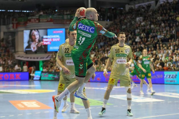 08.03.2026, xgox, Handball - Daikin HBL SC Magdeburg - TSV Hannover-Burgdorf emspor, v.l. Daniel Pettersson (Magdeburg, 11) wirft Tor, Torschuetze, erzielt Tor, Treffer, scores the goal Magdeburg