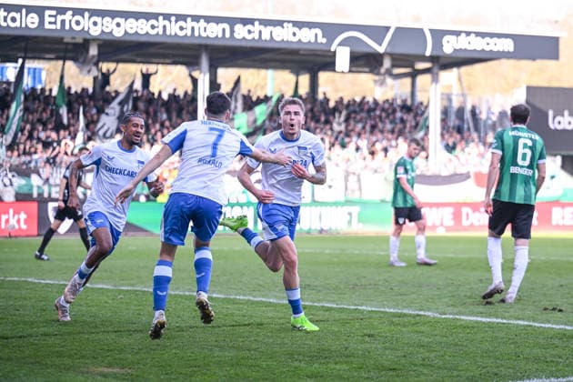 08.03.2026, Fussball, 2. Bundesliga, 25. Spieltag Saison 2025 2026, Preußen Münster - Hertha BSC, Marten Winkler (Hertha BSC) freut sich über das Tor zum 1:2 mit der Mannschaft. xRHR-FOTO TKx