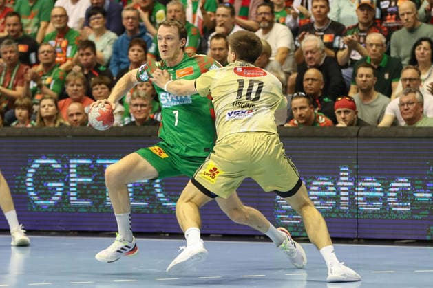 08.03.2026, xgox, Handball - Daikin HBL SC Magdeburg - TSV Hannover-Burgdorf emspor, v.l. Felix Claar (Magdeburg, 7), Renars Uscins (Hannover, 10) Zweikampf, Duell, Kampf, tackle Magdeburg