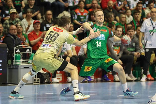 08.03.2026, xgox, Handball - Daikin HBL SC Magdeburg - TSV Hannover-Burgdorf emspor, v.l. Hannes Feise (Hannover, 56), Omar Ingi Magnusson (Magdeburg, 14) Zweikampf, Duell, Kampf, tackle Magdeburg