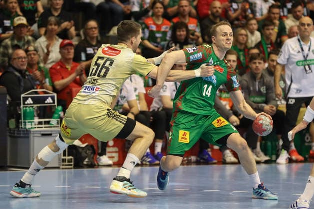 08.03.2026, xgox, Handball - Daikin HBL SC Magdeburg - TSV Hannover-Burgdorf emspor, v.l. Hannes Feise (Hannover, 56), Omar Ingi Magnusson (Magdeburg, 14) Zweikampf, Duell, Kampf, tackle Magdeburg