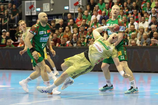 08.03.2026, xgox, Handball - Daikin HBL SC Magdeburg - TSV Hannover-Burgdorf emspor, v.l. Justus Fischer (Hannover, 54) wirft Tor, Torschuetze, erzielt Tor, Treffer, scores the goal Magdeburg