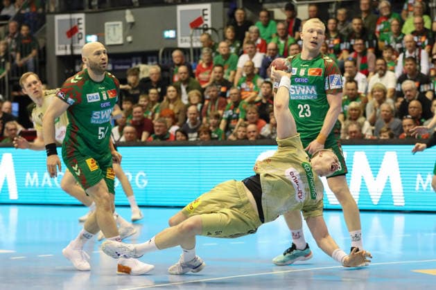 08.03.2026, xgox, Handball - Daikin HBL SC Magdeburg - TSV Hannover-Burgdorf emspor, v.l. Justus Fischer (Hannover, 54) wirft Tor, Torschuetze, erzielt Tor, Treffer, scores the goal Magdeburg