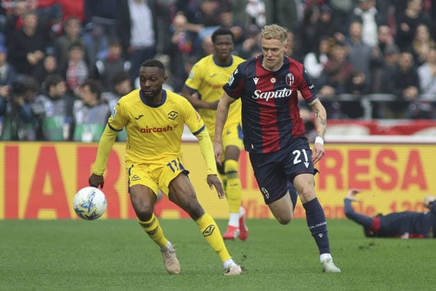 Jean-Daniel Akpa Akpro of Hellas Verona FC battle for the ball with Jens Odgaard of Bologna FC during Bologna FC vs Hellas Verona, 28Â° Serie A Enilive 2025-26 game at Renato Dall Ara stadium in Bologna (BO), Italy, on March 08, 2026.  Copyright: xDavidexCasentini IPAxSportx xipa-agency.netx xx IPA_72574744 IPA_Agency_IPA72574744