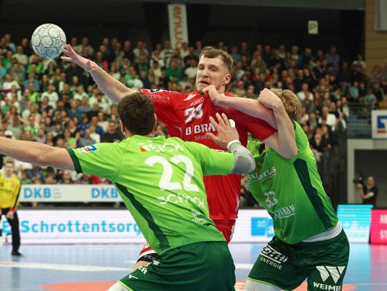 08.03.2026, xovx, Handball Daikin Handball Bundesliga, HSG Wetzlar - MT Melsungen v.l. Jona Schoch (HSG Wetzlar), Dianas Kristopans (MT Melsungen), Georg Löwen (HSG Wetzlar) Wetzlar Buderus-Arena Hessen Deutschland (DE)