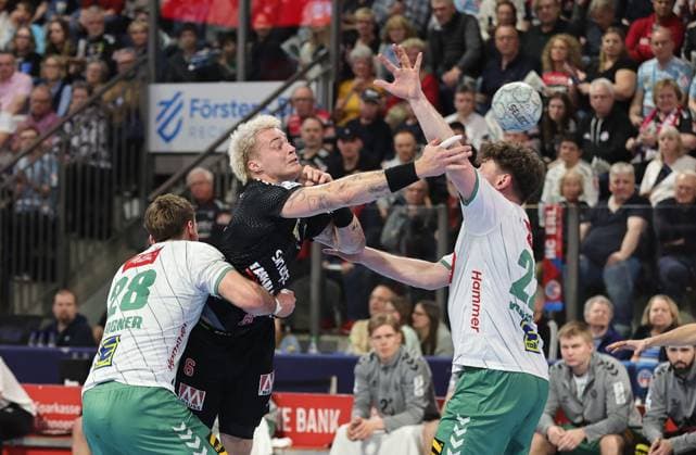 08.03.2026 - Handball - 1. Bundesliga DAIKIN HBL - Saison 2025 2026 - 24. Spieltag: HC Erlangen Metropolregion Nürnberg HCE - GWD Minden - DaMa - xdaxmax - Tom Bergner (28, GWD Minden ) Marek Nissen (6, HC Erlangen HCE ) Philipp Vorlicek (22, GWD Minden )