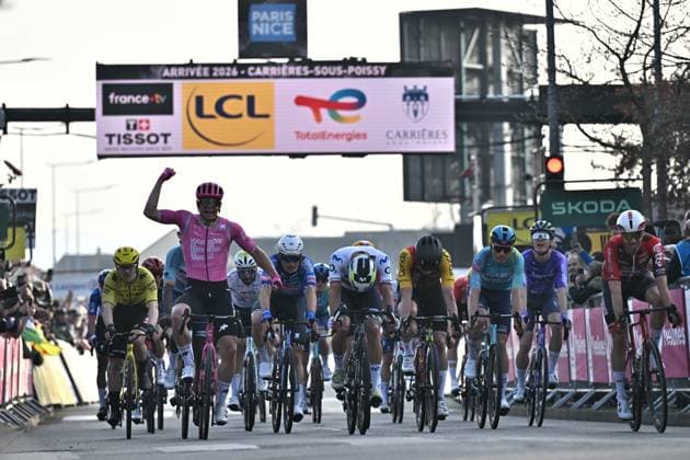 American Luke Lamperti of EF Education - EasyPost celebrates as he wins the sprint at the first stage of 84th edition of the Paris-Nice cycling race, 170,9 km from Archeres to Carrieres-sous-Poissy, Sunday 08 March 2026. DAVIDxPINTENS  x166866181x