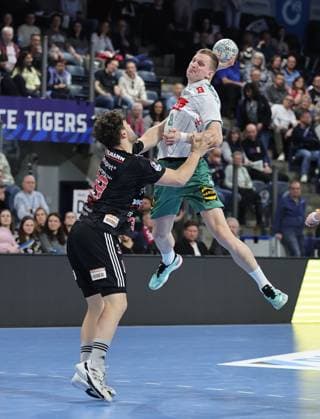08.03.2026 - Handball - 1. Bundesliga DAIKIN HBL - Saison 2025 2026 - 24. Spieltag: HC Erlangen Metropolregion Nürnberg HCE - GWD Minden - DaMa - xdaxmax - Tobias Buck (39, HC Erlangen HCE ) Karolis Antanavicius (8, GWD Minden )