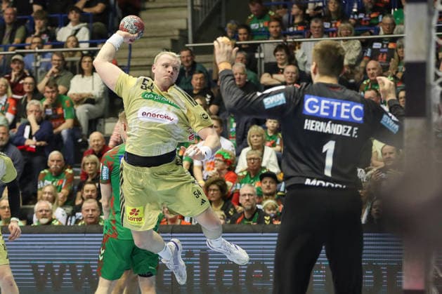 08.03.2026, xgox, Handball - Daikin HBL SC Magdeburg - TSV Hannover-Burgdorf emspor, v.l. Justus Fischer (Hannover, 54) wirft Tor, Torschuetze, erzielt Tor, Treffer, scores the goal Magdeburg
