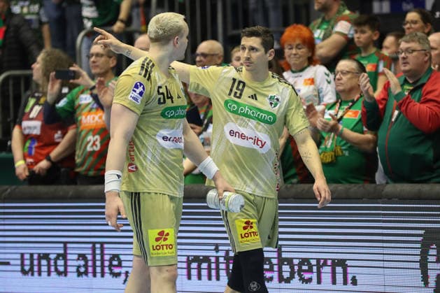 08.03.2026, xgox, Handball - Daikin HBL SC Magdeburg - TSV Hannover-Burgdorf emspor, v.l. Justus Fischer (Hannover, 54), Marius Steinhauser (Hannover, 19) diskutieren nach dem Spiel Magdeburg