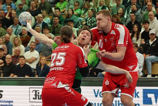 08.03.2026, xovx, Handball Daikin Handball Bundesliga, HSG Wetzlar - MT Melsungen v.l. Olle Forsell Schefvert (MT Melsungen), Justin Müller (HSG Wetzlar), Dainis Kristopans (MT Melsungen) Wetzlar Buderus-Arena Hessen Deutschland (DE)