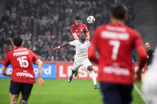 Lille OSC v FC Lorient - Ligue 1 McDonald s 17 Jean Victor MAKENGO (fcl) - 23 Aissa MANDI (losc) during the Ligue 1 McDonald s match between Lille and Lorient at Stade Pierre Mauroy on March 8, 2026 in Lille, France. Lille France  Copyright: xFEPx 776348315