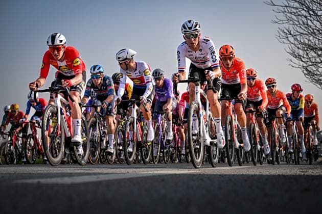 The pack of riders pictured in action during the first stage of 84th edition of the Paris-Nice cycling race, 170,9 km from Archeres to Carrieres-sous-Poissy, Sunday 08 March 2026. DAVIDxPINTENS  x166877000x