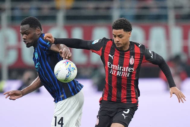 AC Milan s Koni De Winter fights for the ball with Inter Milan s Ange-Yoan Bonny during the Serie A soccer match between Milan and Inter at the San Siro Stadium in Milan , north Italy - Sunday , March 08 , 2026. - Soccer .  Copyright: xSpada LaPressex