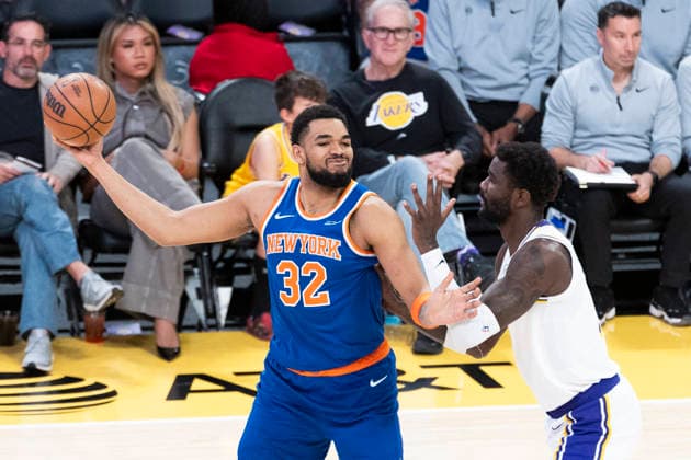 March 8, 2026, Los Angeles, California, USA: New York KnicksÃ¢â‚¬â ¢ Karl-Anthony Towns (32) is defended by Los Angeles LakersÃ¢â‚¬â ¢ Deandre Ayton (5) during an NBA, Basketball Herren, USA basketball game at Crypto.com Arena on Sunday, March 8, 2026 in Los Angeles. NBA 2026: Knicks Vs Lakers  - ZUMAc68_ 20260308_zaf_c68_018 Copyright: xRingoxChiux