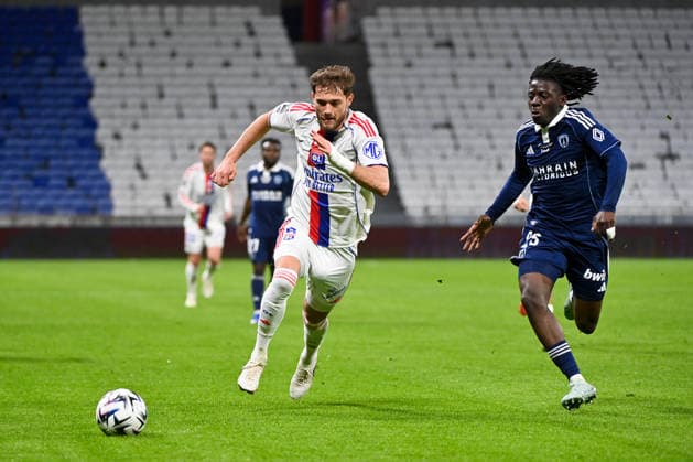 Olympique Lyonnais v Paris FC - Ligue 1 McDonald s 2025 2026 06 Tanner TESSMANN (ol) - 23 Rudy Nzingoula MATONDO (pfc) during the Ligue 1 McDonald s match between Lyon and Paris FC at Groupama Stadium on March 8, 2026 in Lyon, France. Lyon France  Copyright: xFEPx 776348314