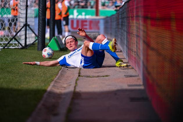 08.03.2026, Fussball, 2. Bundesliga, 25. Spieltag Saison 2025 2026, Preußen Münster - Hertha BSC, Fabian Reese (Hertha BSC) liegt am Boden, xRHR-FOTO TKx