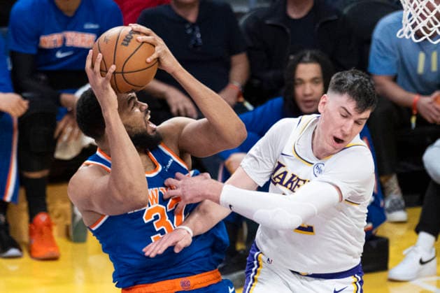 March 8, 2026, Los Angeles, California, USA: New York KnicksÃ¢â‚¬â ¢ Karl-Anthony Towns (32) shoots against Los Angeles LakersÃ¢â‚¬â ¢ Jake LaRavia (12) during an NBA, Basketball Herren, USA basketball game at Crypto.com Arena on Sunday, March 8, 2026 in Los Angeles. NBA 2026: Knicks Vs Lakers  - ZUMAc68_ 20260308_zaf_c68_036 Copyright: xRingoxChiux