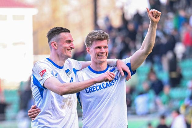 08.03.2026, Fussball, 2. Bundesliga, 25. Spieltag Saison 2025 2026, Preußen Münster - Hertha BSC, Niklas Kolbe (Hertha BSC), Luca Schuler (Hertha BSC) xRHR-FOTO TKx