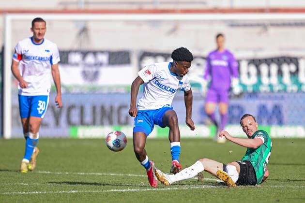 08.03.2026, Fussball, 2. Bundesliga, 25. Spieltag Saison 2025 2026, Preußen Münster - Hertha BSC, Boris Mamuzah Lum (Hertha BSC), Jorrit Hendrix (Preußen Münster) xRHR-FOTO TKx