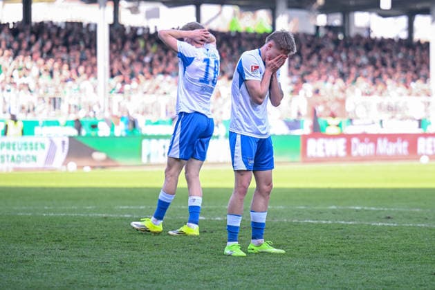 08.03.2026, Fussball, 2. Bundesliga, 25. Spieltag Saison 2025 2026, Preußen Münster - Hertha BSC, Luca Schuler (Hertha BSC), Jannis Heuer (Preußen Münster) xRHR-FOTO TKx