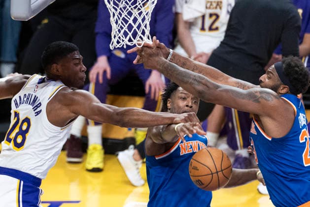 March 8, 2026, Los Angeles, California, USA: Los Angeles LakersÃ¢â‚¬â ¢ Rui Hachimura (28) vies for the rebound against New York KnicksÃ¢â‚¬â ¢ OG Anunoby (8) and Mitchell Robinson (23) during an NBA, Basketball Herren, USA basketball game at Crypto.com Arena on Sunday, March 8, 2026 in Los Angeles. NBA 2026: Knicks Vs Lakers  - ZUMAc68_ 20260308_zaf_c68_038 Copyright: xRingoxChiux
