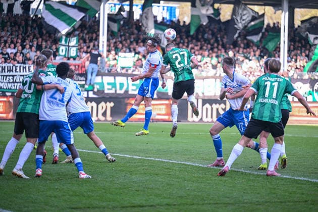 08.03.2026, Fussball, 2. Bundesliga, 25. Spieltag Saison 2025 2026, Preußen Münster - Hertha BSC, Fabian Reese (Hertha BSC), Jano ter Horst (Preußen Münster) xRHR-FOTO TKx