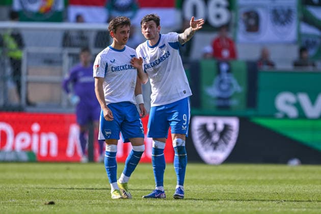 08.03.2026, Fussball, 2. Bundesliga, 25. Spieltag Saison 2025 2026, Preußen Münster - Hertha BSC, MichaÅ‚ Karbownik (Hertha BSC), Dawid Kownacki (Hertha BSC) xRHR-FOTO TKx