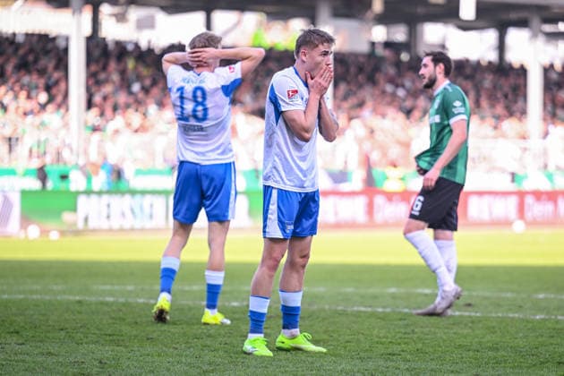 08.03.2026, Fussball, 2. Bundesliga, 25. Spieltag Saison 2025 2026, Preußen Münster - Hertha BSC, Luca Schuler (Hertha BSC), Jannis Heuer (Preußen Münster) xRHR-FOTO TKx