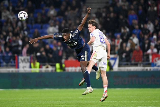 Olympique Lyonnais v Paris FC - Ligue 1 McDonald s 2025 2026 23 Tyler MORTON (ol) - 18 Marshall MUNETSI (pfc) during the Ligue 1 McDonald s match between Lyon and Paris FC at Groupama Stadium on March 8, 2026 in Lyon, France. Lyon France  Copyright: xFEPx 776348314