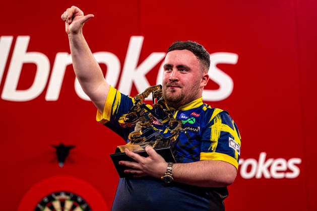 8th March 2026; Butlins Resort, Minehead, Somerset, England; 2026 PDC Ladbrokes UK Open Darts Final Night; Luke Littler celebrates winning the final against James Wade and holds the Ladbrokes UK Open Trophy  GodfreyxPitt