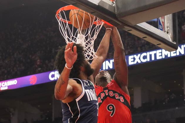 March 8, 2026, Toronto, On, CAN: Toronto Raptors RJ Barrett (9) scores on Dallas Mavericks Marvin Bagley III (35) during first half NBA, Basketball Herren, USA basketball action in Toronto on Sunday, March 8, 2025. RJ Barrett; Marvin Bagley III  - ZUMAc35_ 20260308_zaf_c35_104 Copyright: xChrisxYoungx