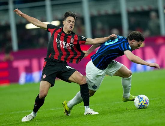 (260309) -- MILAN, March 9, 2026 -- AC Milan s Samuele Ricci (L) vies with Inter Milan s Carlos Augusto during an Italian Serie A football match between AC Milan and Inter Milan in Milan, Italy, March 8, 2026. ) (SP)ITALY-MILAN-FOOTBALL-SERIE A-AC MILAN VS INTER MILAN LixJing 