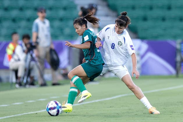 SOCCER ASIAN CUP BANGLADESH UZBEKISTAN, Monika Chakma of Bangladesh is tackled by Ilvina Ablyakimova of Uzbekistan during the AFC Women™s Asian Cup Group B match between Bangladesh and Uzbekistan at HBF Park in Perth, Monday, March 9, 2026.( NO ARCHIVING, EDITORIAL USE ONLY PERTH WESTERN AUSTRALIA AUSTRALIA  Copyright: xRICHARDxWAINWRIGHTx 20260309163731216629