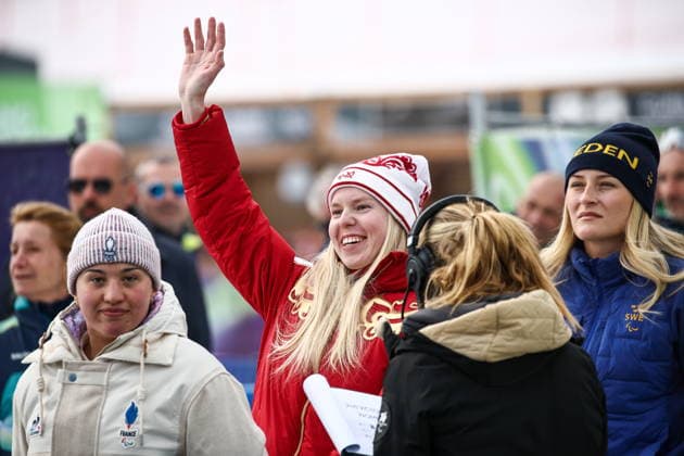 ITALY, VENETO - MARCH 9, 2026: Silver medallist Aurelie Richard of France, gold medal winner Varvara Voronchikhina of Russia and bronze medallist Ebba Aarsjoe of Sweden (L-R midground) during the victory ceremony for the women s para alpine skiing super G standing event at Tofane Alpine Skiing Centre during the 2026 Winter Paralympic Games, in Cortina d Ampezzo, Province of Belluno 2026 Winter Paralympics: Para Alpine Skiing  - ZUMAt113 20260309_zaa_t113_177 Copyright: xMikhailxTereshchenkox