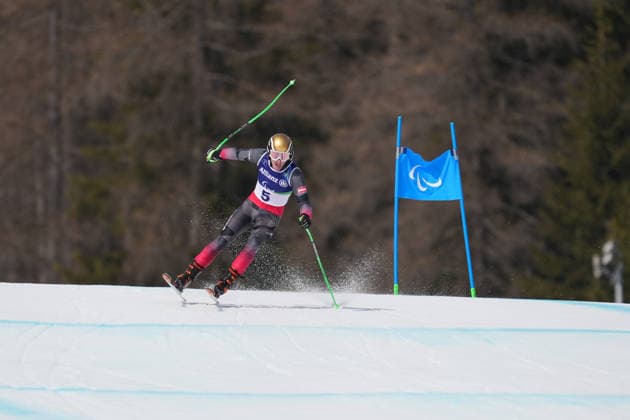(260309) -- CORTINA D AMPEZZO, March 9, 2026 -- Johannes Aigner of Austria competes during the men s super G vision impaired final match of para alpine skiing at the Milan-Cortina 2026 Paralympic Winter games, Winterspiele,Spiele, Summer games in Cortina D ampezzo, Italy, March 9, 2026. Mu Yu) (SP)ITALY-CORTINA D AMPEZZO-PARALYMPIC WINTER GAMES-PARA ALPINE SKIING-MEN S SUPER G VISION IMPAIRED-FINAL MouxYu 