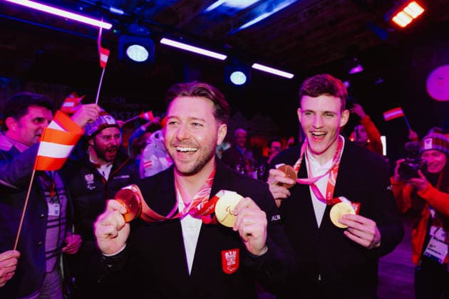 PARALYMPICS - Winter Paralympics Milano Cortina 2026 CORTINA D AMPEZZO,ITALY,09.MAR.26 - PARALYMPICS - Paralympic Winter games, Winterspiele,Spiele, Summer games Milano Cortina 2026, Austria House, Kaernten-Abend. Image shows guide Nico Haberl and Johannes Aigner (AUT). Keywords: medal.  GEPAxpictures xMaticxKlansek