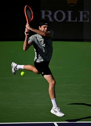 Tennis 2026: BNP Paribas Open MAR 09 March 09, 2026 Taylor Fritz returns a shot against Alex Michelsen during their third round match at the BNP Paribas Open held at the Indian Wells Tennis Garden in Indian Wells, California. California. Mandatory Photo Credit : Charles Baus CSM (Credit Image: Â Charles Baus Cal Media) Indian Wells Ca United States of America EDITORIAL USE ONLY Copyright: xx ZUMA-20260309_zma_c04_220.jpg CharlesxBausx csmphotothree479004