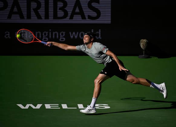 Tennis 2026: BNP Paribas Open MAR 09 March 09, 2026 Taylor Fritz returns a shot against Alex Michelsen during their third round match at the BNP Paribas Open held at the Indian Wells Tennis Garden in Indian Wells, California. California. Mandatory Photo Credit : Charles Baus CSM (Credit Image: Â Charles Baus Cal Media) Indian Wells Ca United States of America EDITORIAL USE ONLY Copyright: xx ZUMA-20260309_zma_c04_219.jpg CharlesxBausx csmphotothree479005