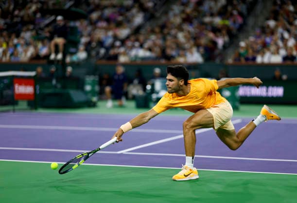 March 09, 2026 Carlos Alcaraz (ESP) attempts to return a shot against Arthur Rinderknech (FRA) during their third round match at the BNP Paribas Open held at the Indian Wells Tennis Garden in Indian Wells, California. California. Mandatory Photo Credit : CSM Indian Wells United States of America - ZUMAc04_ 20260309_zma_c04_287 Copyright: xCharlesxBausx