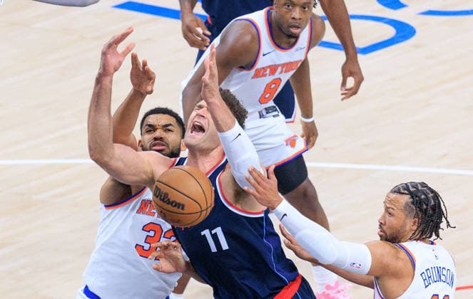 March 9, 2026, Inglewood, California, USA: Brook Lopez 11 of the Los Angeles Clippers battles for a lose ball with Karl-Anthony Towns 32 and Jalen Brunson 11 of the New York Knicks during a 2026 NBA, Basketball Herren, USA regular season game on Monday March 9, 2026 at Intuit Dome Arena in Inglewood, California. Clippers defeat Knicks, 126-118. JAVIER ROJAS PI Inglewood USA - ZUMAp124 20260309_zaa_p124_082 Copyright: xJavierxRojasx