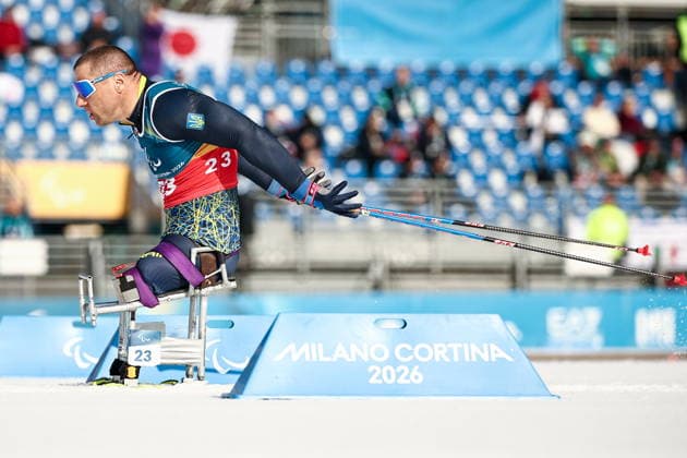 ITALY, TESERO - MARCH 10, 2026: Pavlo Bal of Ukraine competes in a men s para cross-country skiing sitting sprint at Tesero Cross-Country Stadium during the 2026 Winter Paralympic Games. Mikhail Tereshchenko TASS  89842110