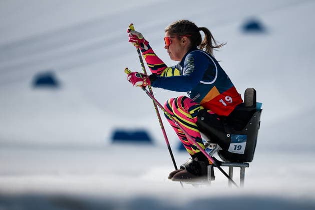 ITALY, TESERO - MARCH 10, 2026: Kristrun Gudnadottir of Iceland competes in a women s para cross-country skiing sitting sprint at Tesero Cross-Country Stadium during the 2026 Winter Paralympic Games. Mikhail Tereshchenko TASS  89842618