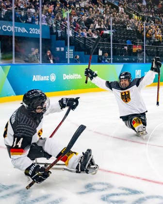 Para Ice hockey, Eishockey - Millano Cortina 2026 Winter Paralympics: Day 4 Para Ice Hockey - Milano Cortina 2026 Winter Paralympics: Day 4 MILANO SANTAGIULIA ICE HOCKEY ARENA BUSSMANN Jano (No. 14, Athlet, Forward, 09.03.2007, Club Wiehl Penguins) scores the first goal for team Germany. WEDDE Joerg (No. 77, Athlet, Forward, 18.08.1965, Club Hannover Ice Lions) is happy about the success of his young teammate. MILANO, ITALY - MARCH 10: Preliminary Round - Group A Italy - Germany Impressions of Team Para Ice Hockey Germany playing Team ITA at March 10 at the Milano Cortina 2026 Winter Paralympics Para Ice Hockey Tournament in the Milano Santagiulia Ice Hockey Arena at day 4. (Photo by RALF KUCKUCK) Copyright 2026 Ralf Kuckuck